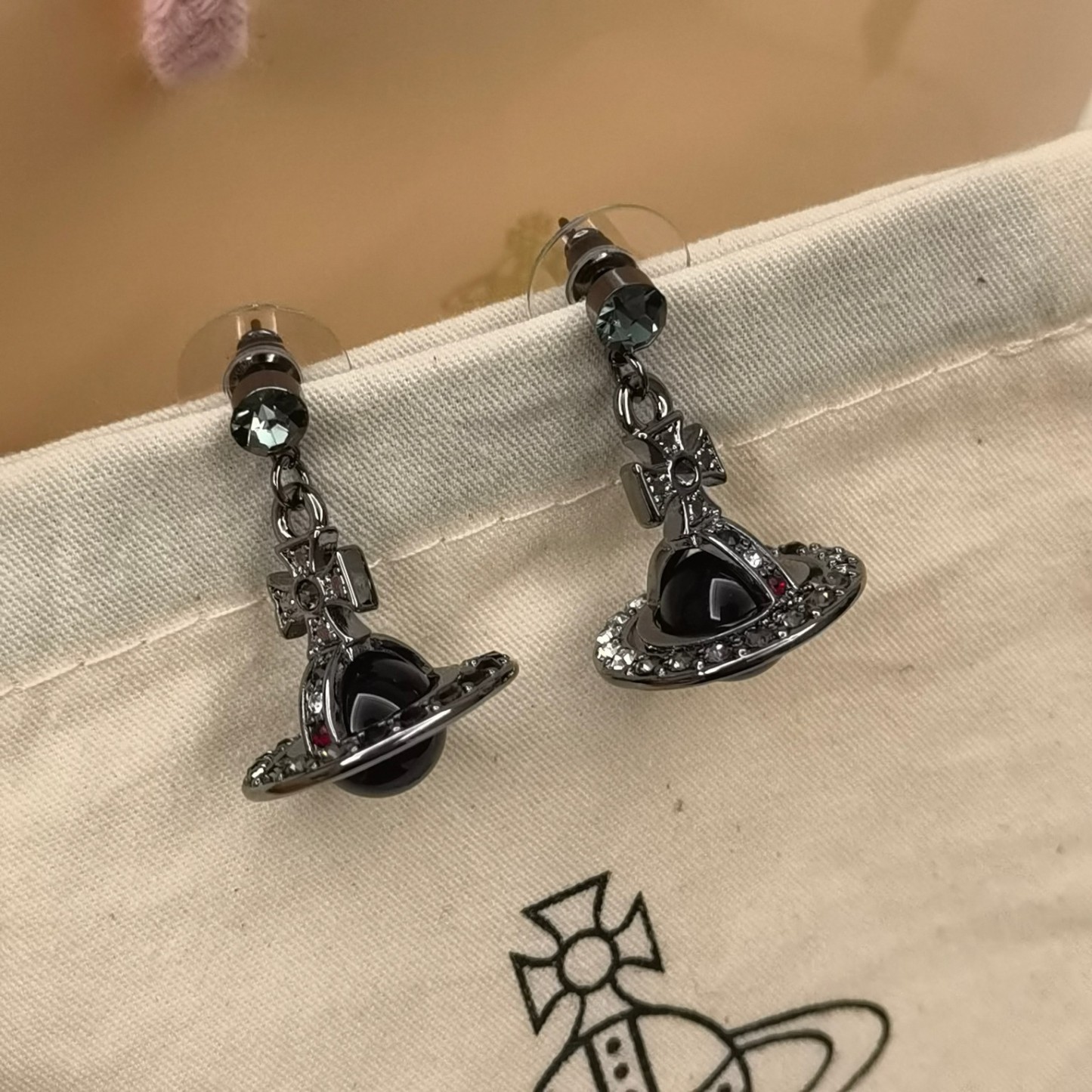 Buy replica Vivienne Westwood Punk Style Cool Girl Black Saturn Earrings and replica jewelry from PICKS Jewelry