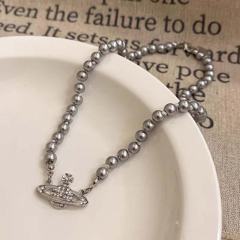 Buy replica Vivienne Westwood Saturn Pendant Grey Pearl Necklace and replica jewelry from PICKS Jewelry