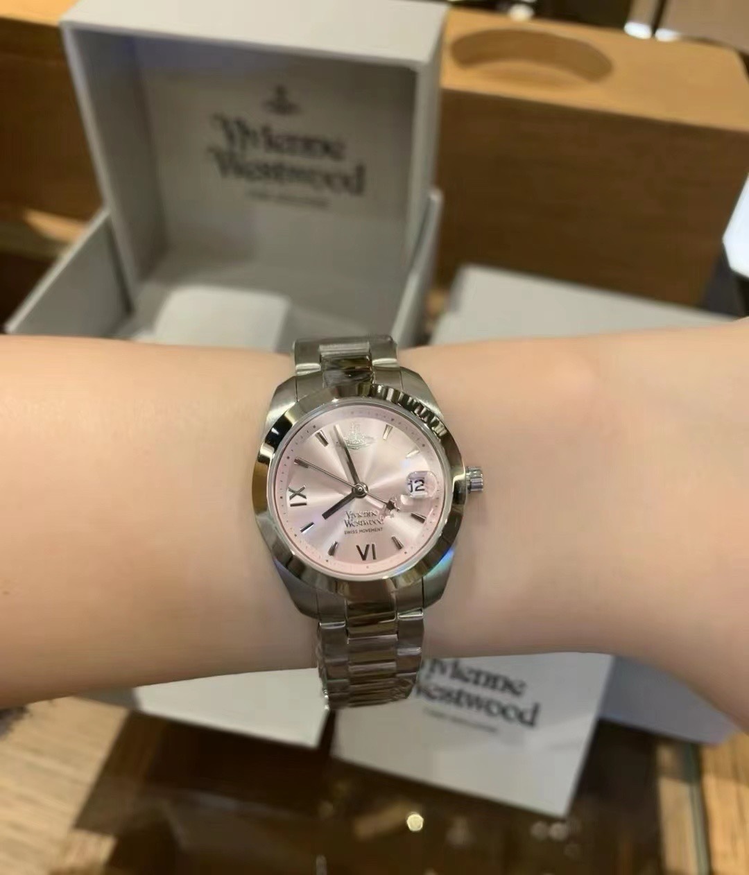 Buy replica Vivienne Westwood Light Pink Dial Saturn Watch - 28MM and replica jewelry from PICKS Jewelry