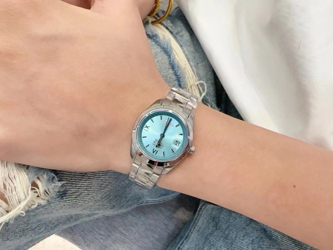 Buy replica Vivienne Westwood Light Blue Dial Silver Band Saturn Watch - 28MM and replica jewelry from PICKS Jewelry