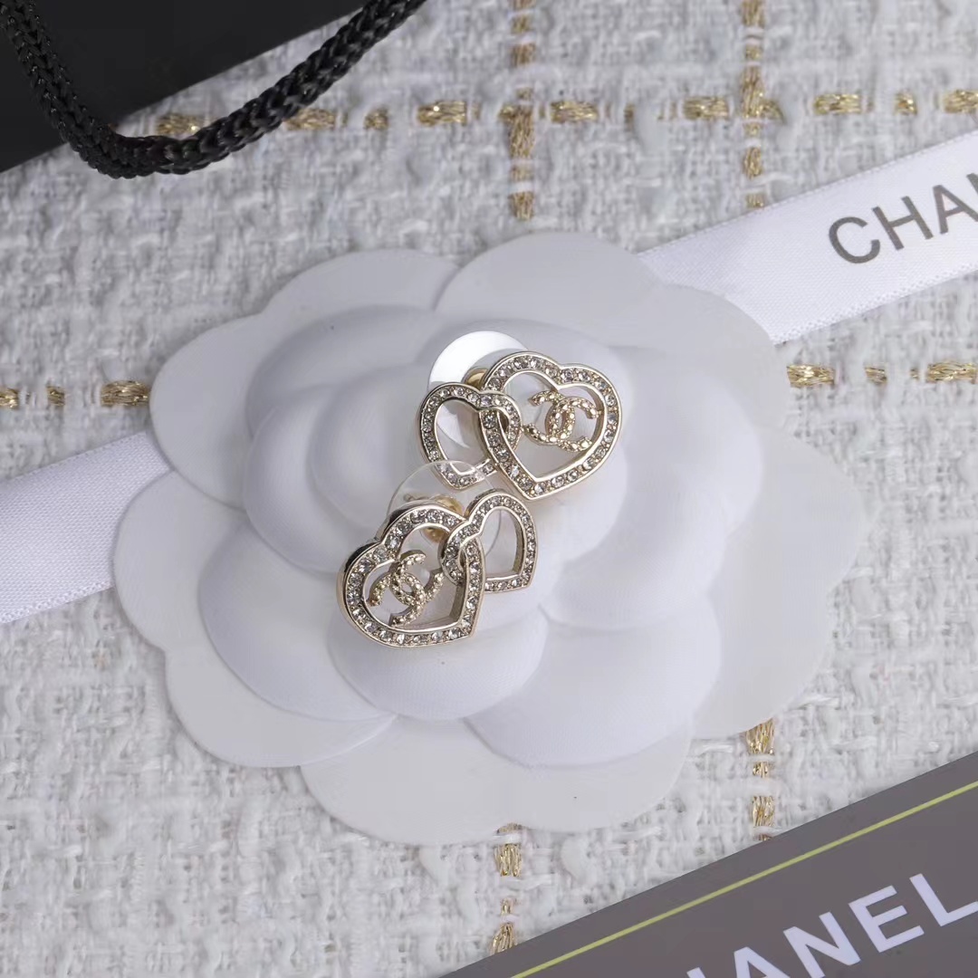 Buy replica Chanel Two Hollow Heart Stud Earrings and replica jewelry from PICKS Jewelry