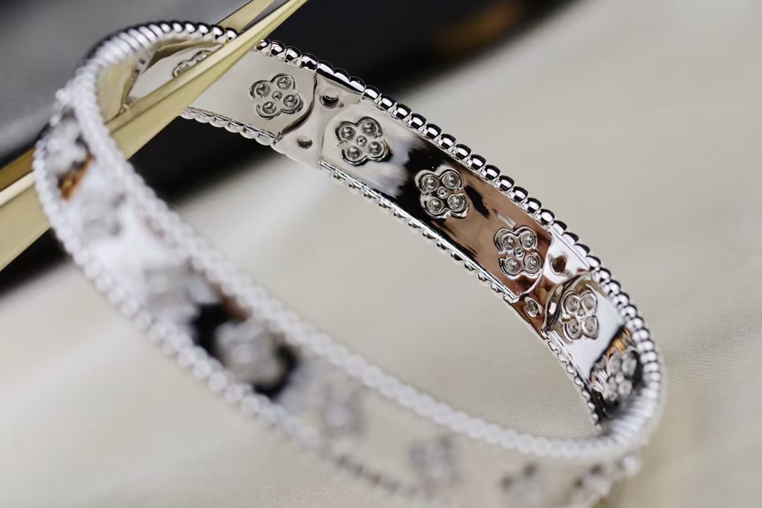Buy replica Van Cleef & Arpels Perlée Clovers Bracelet, Medium Bangle and replica jewelry from PICKS Jewelry