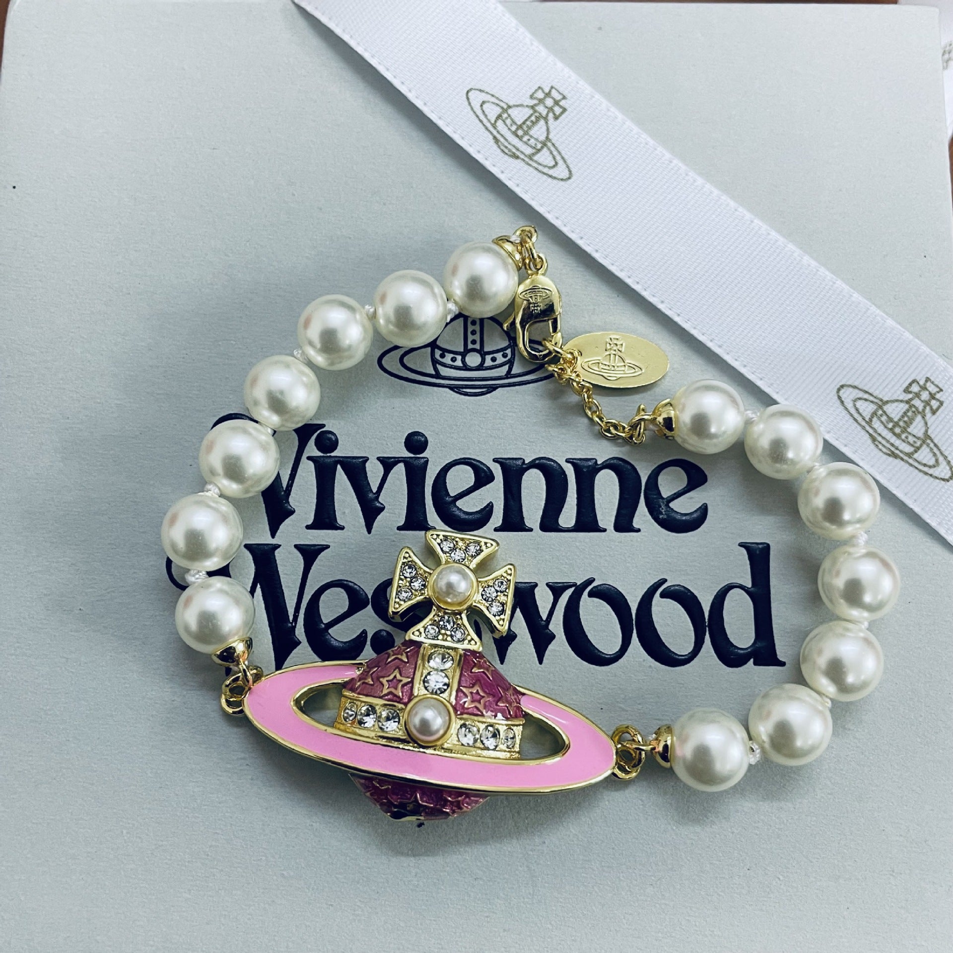Buy replica Vivienne Westwood Enamel Diamond Saturn Bracelet and replica jewelry from PICKS Jewelry