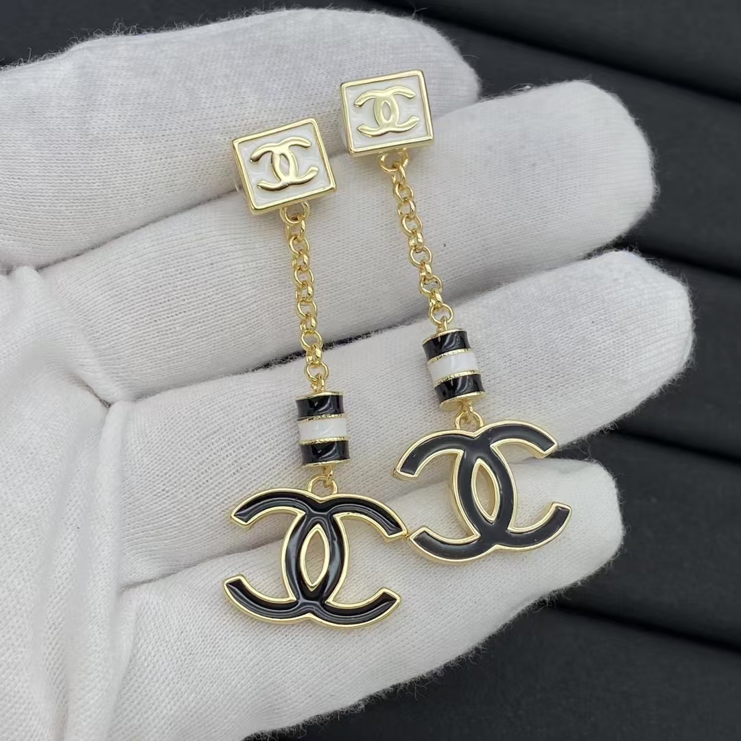 Buy replica Chanel Black White Enamel Chain Tassel with Double C Earrings and replica jewelry from PICKS Jewelry