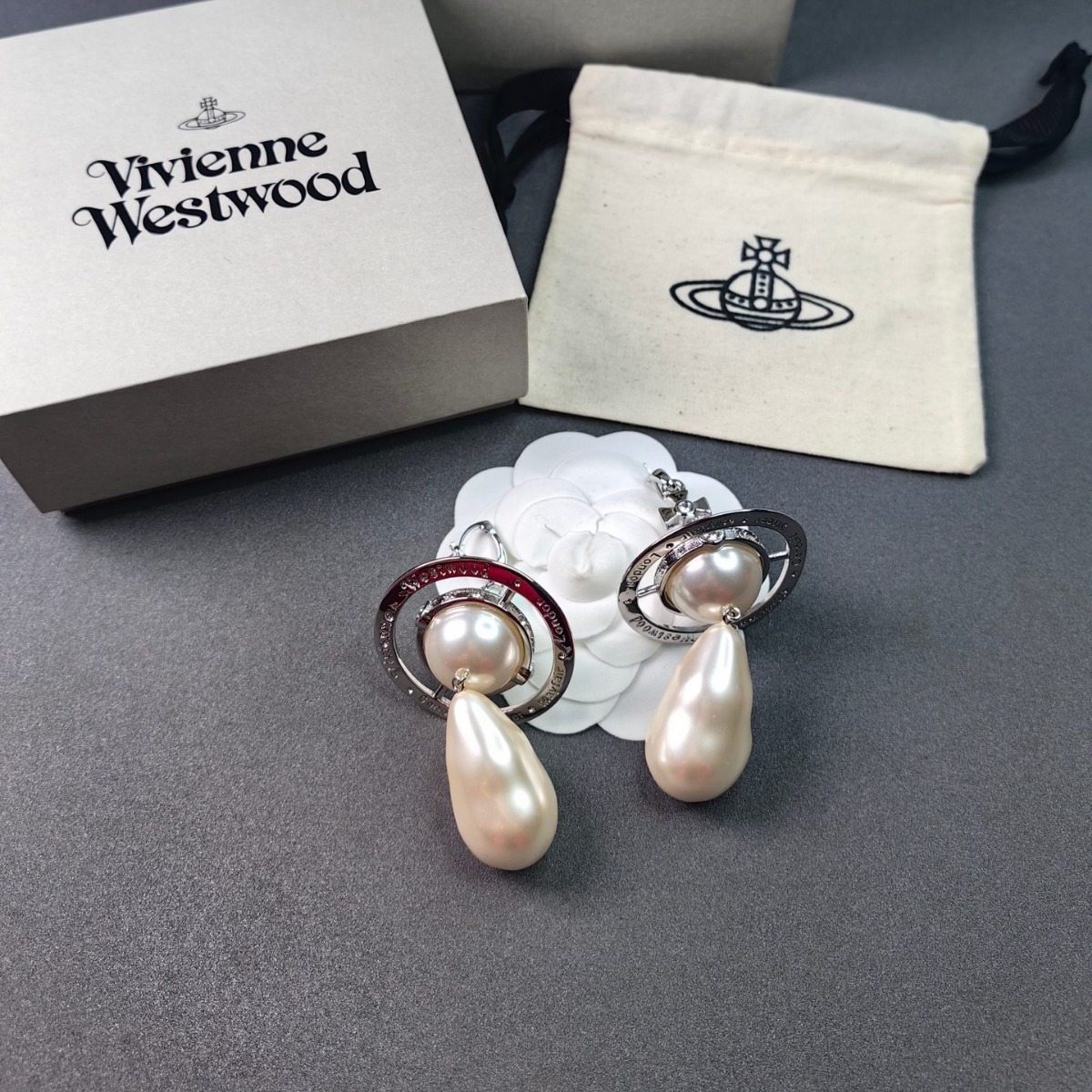 Buy replica Vivienne Westwood Exaggerated Large Baroque Pearl Earrings and replica jewelry from PICKS Jewelry