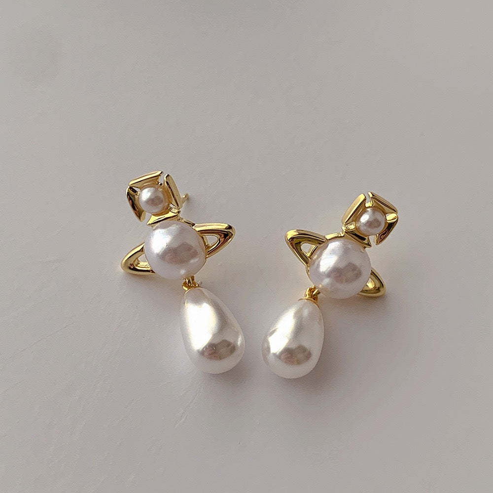 Buy replica Vivienne Westwood Teardrop Pearl Saturn Earrings and replica jewelry from PICKS Jewelry