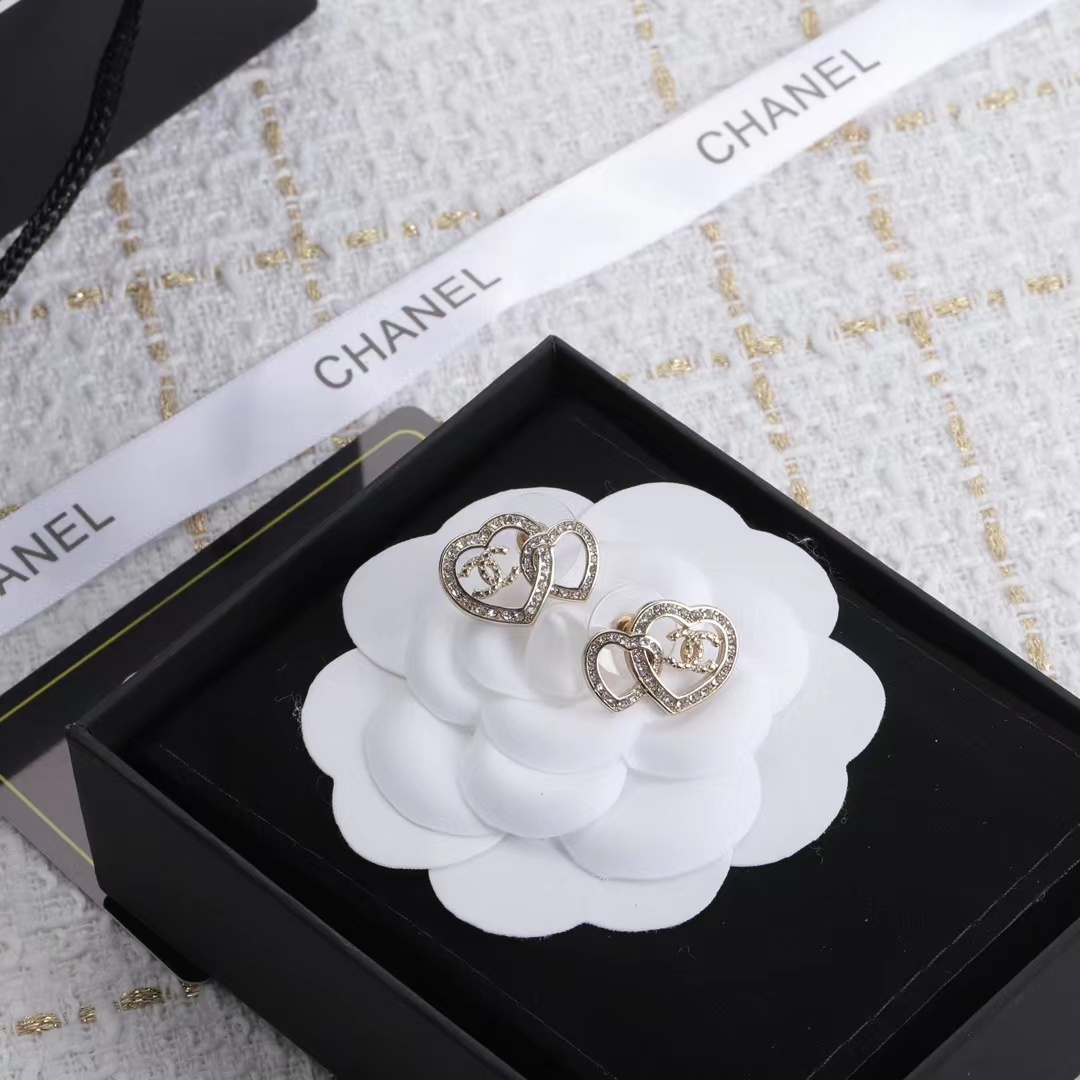 Buy replica Chanel Two Hollow Heart Stud Earrings and replica jewelry from PICKS Jewelry