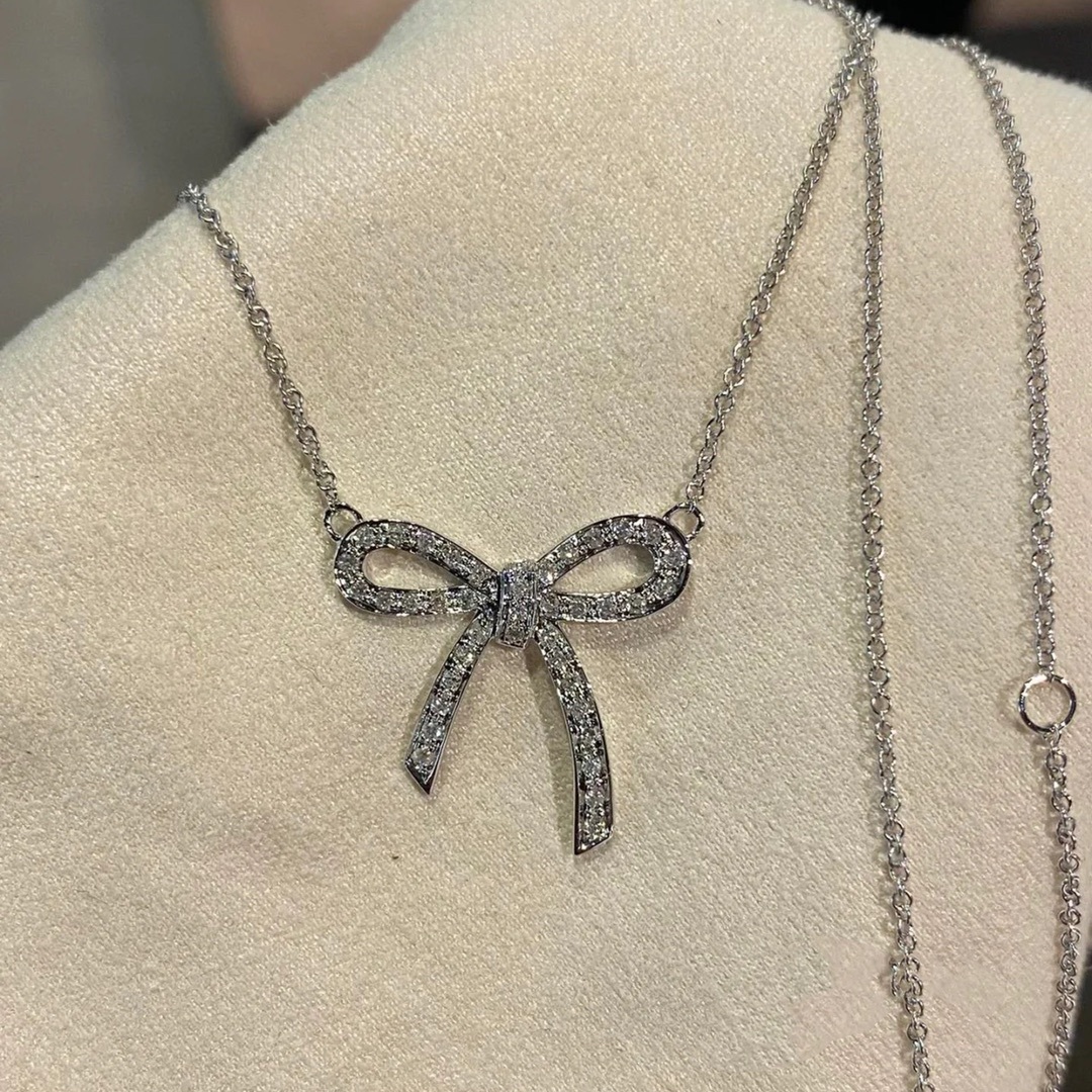 Buy replica Tiffany Large Full Diamond Bow Pendant Necklace and replica jewelry from PICKS Jewelry