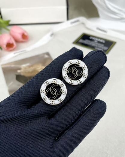 Buy replica Chanel Round White and Black Enamel Stud Earrings and replica jewelry from PICKS Jewelry