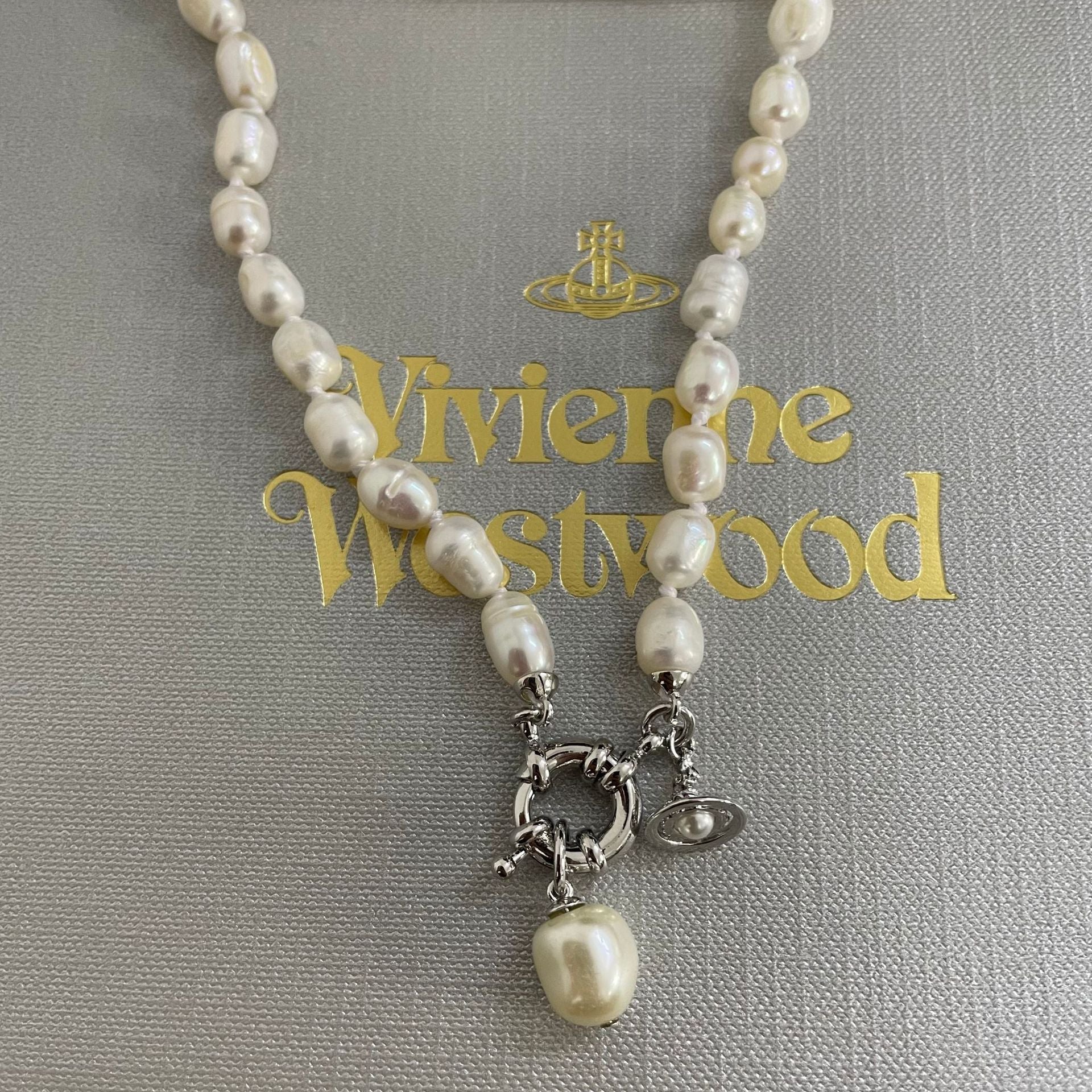 Buy replica Vivienne Westwood Teardrop Pearl Charm Pendant Necklace and replica jewelry from PICKS Jewelry