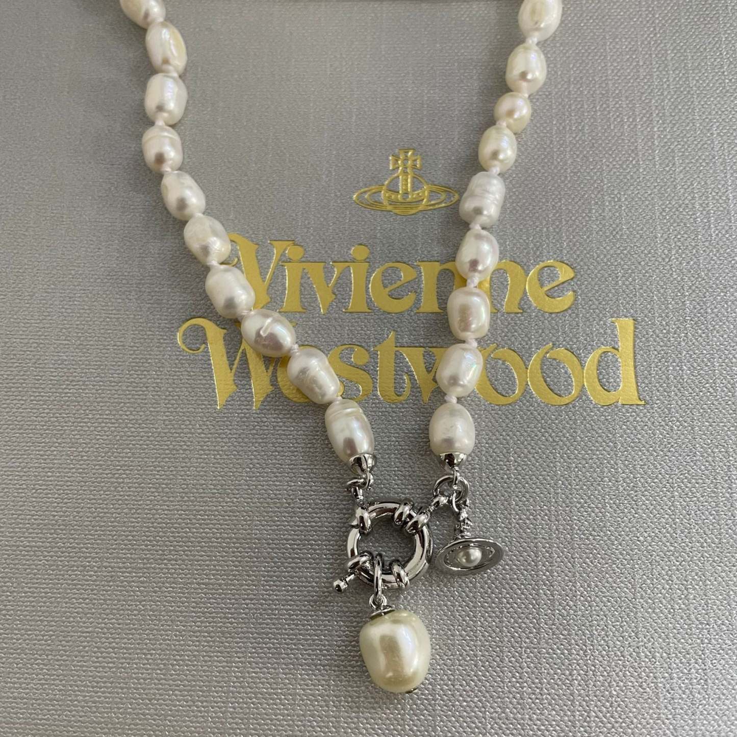 Buy replica Vivienne Westwood Teardrop Pearl Charm Pendant Necklace and replica jewelry from PICKS Jewelry