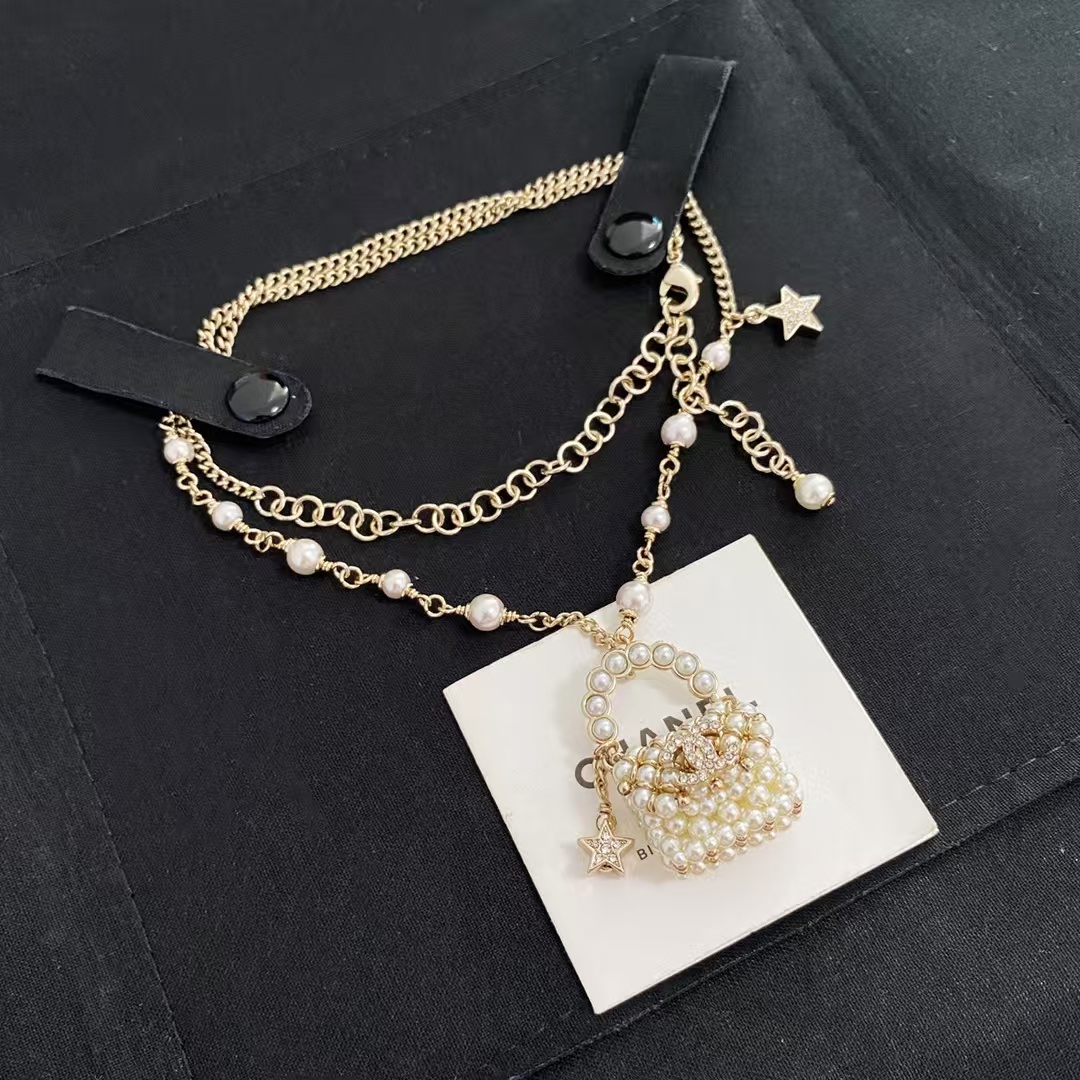 Buy replica Chanel Pearl Bag Pendant Necklace and replica jewelry from PICKS Jewelry