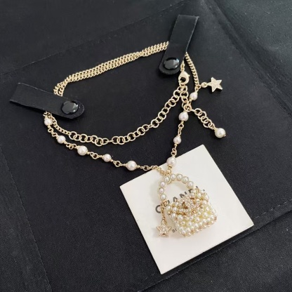 Buy replica Chanel Pearl Bag Pendant Necklace and replica jewelry from PICKS Jewelry