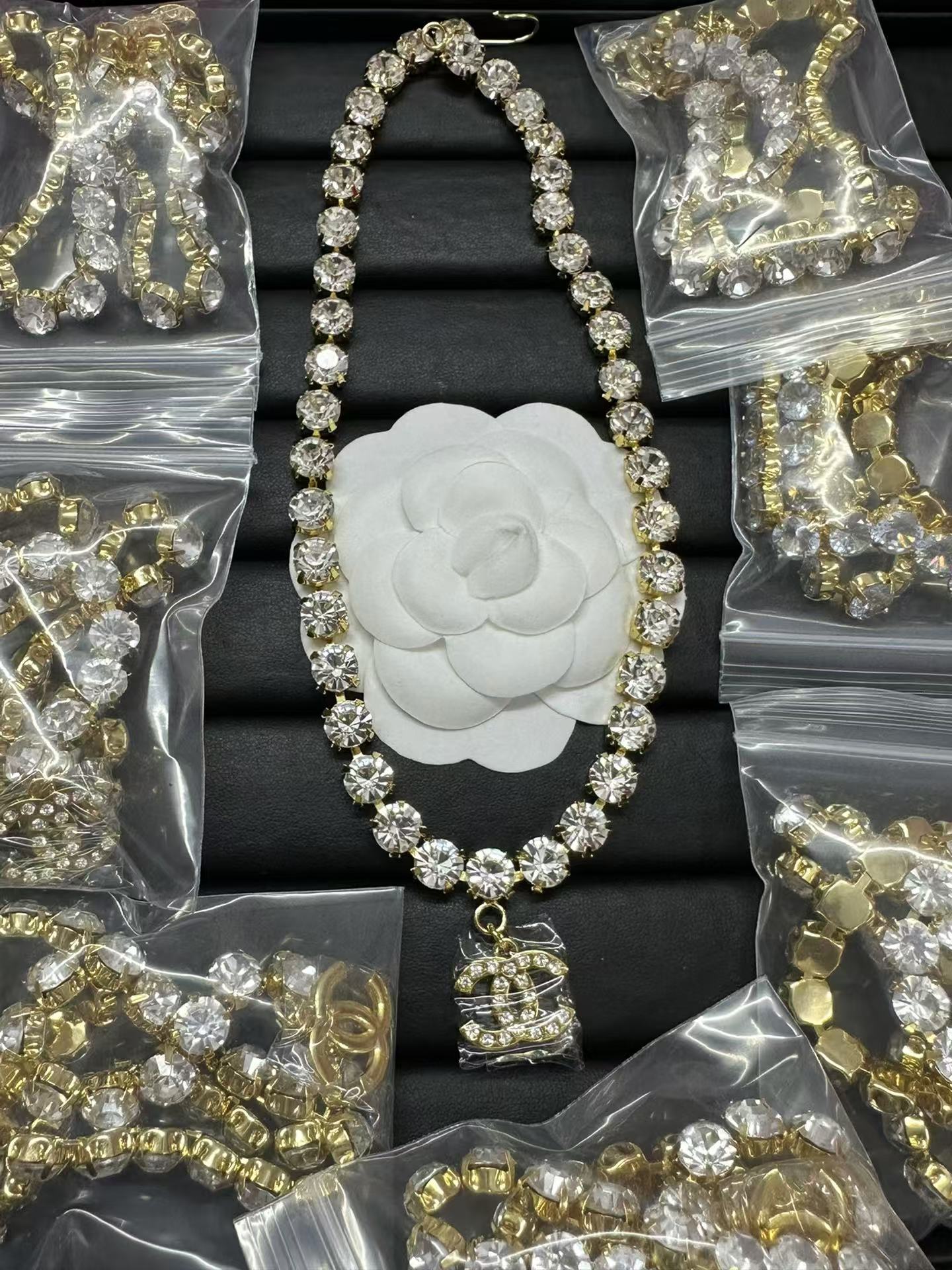 Buy replica Chanel Logo Pendant Rhinestone Strass Chain Necklace and replica jewelry from PICKS Jewelry
