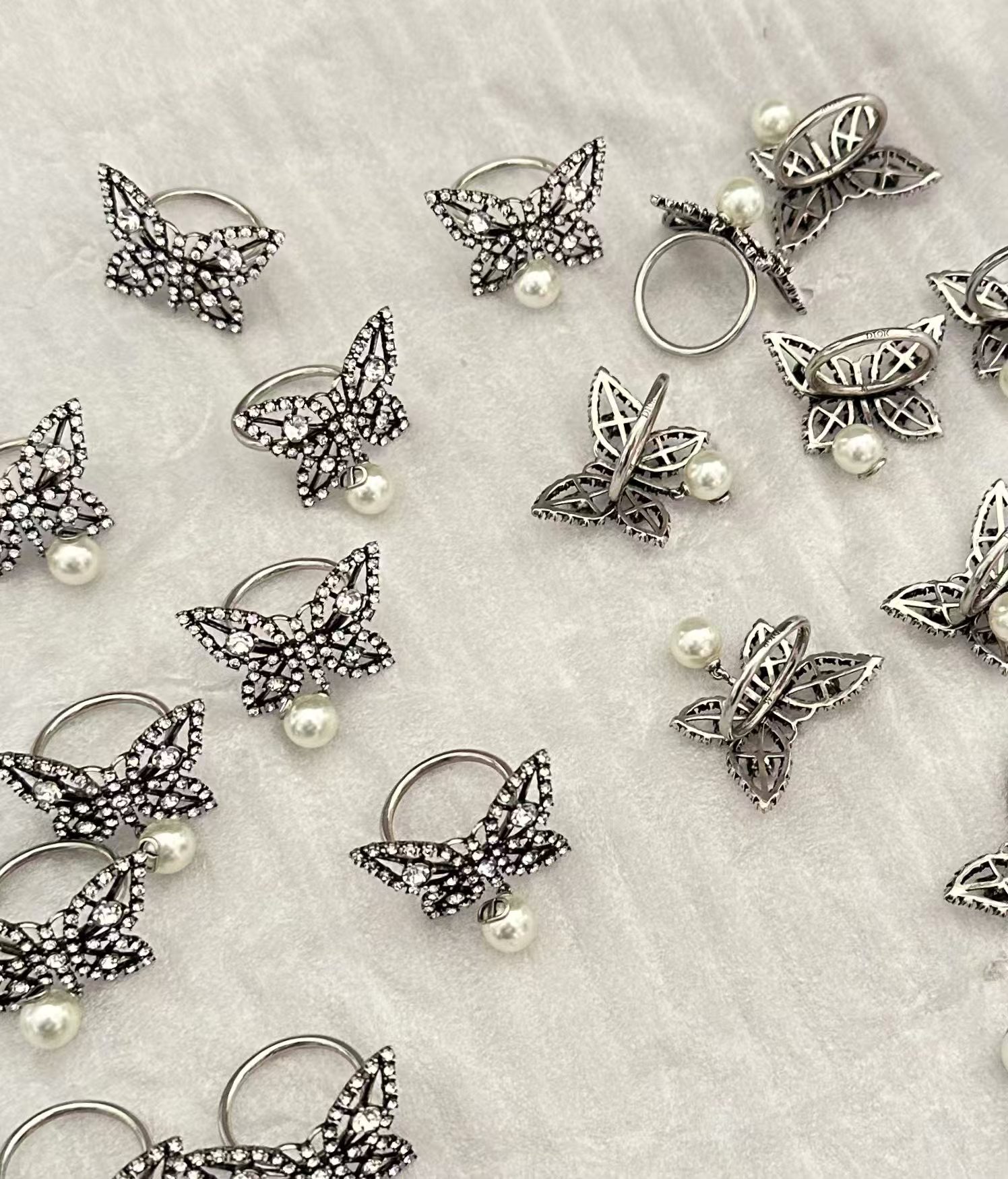 Buy replica Dior Butterfly Pearl Dangle Ring and replica jewelry from PICKS Jewelry
