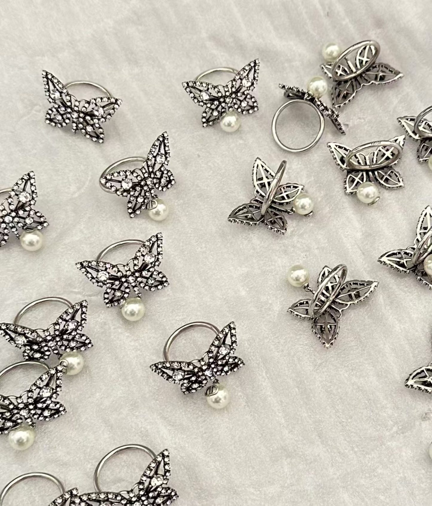 Buy replica Dior Butterfly Pearl Dangle Ring and replica jewelry from PICKS Jewelry