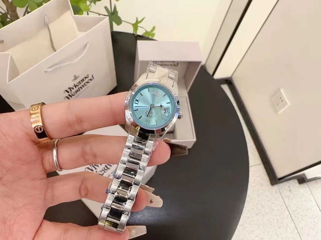 Buy replica Vivienne Westwood Light Blue Dial Silver Band Saturn Watch - 28MM and replica jewelry from PICKS Jewelry