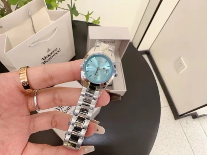 Buy replica Vivienne Westwood Light Blue Dial Silver Band Saturn Watch - 28MM and replica jewelry from PICKS Jewelry