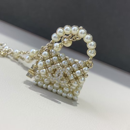 Buy replica Chanel Pearl Bag Pendant Necklace and replica jewelry from PICKS Jewelry