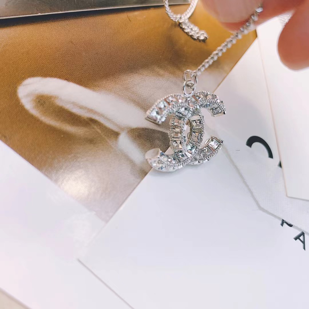 Buy replica Chanel Silver Color Tassel Pendant Necklace and replica jewelry from PICKS Jewelry