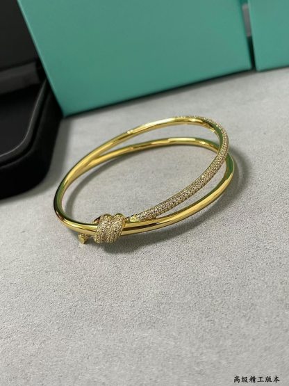 Buy replica Tiffany Knot Double Row Hinged Bangle and replica jewelry from PICKS Jewelry