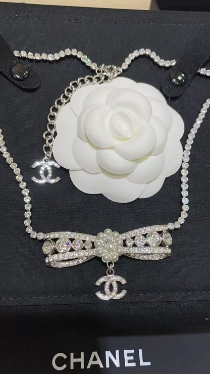 Buy replica Chanel Rhinestone Strass Bowknot Pendant Necklace and replica jewelry from PICKS Jewelry
