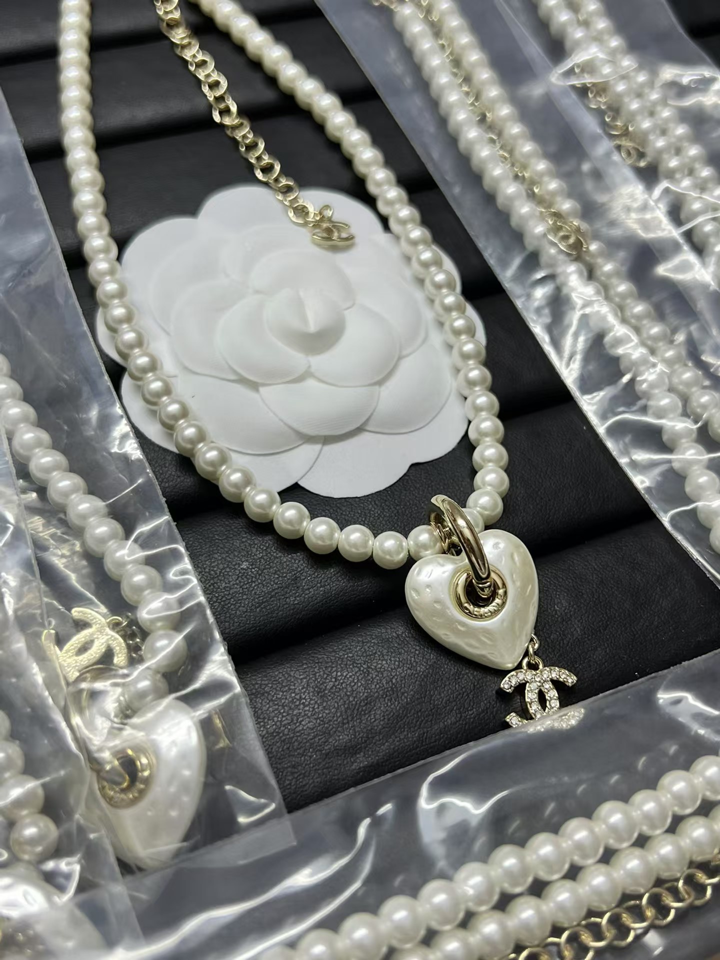 Buy replica Chanel Heart with Double C Pendant Drop Pearl Necklace and replica jewelry from PICKS Jewelry