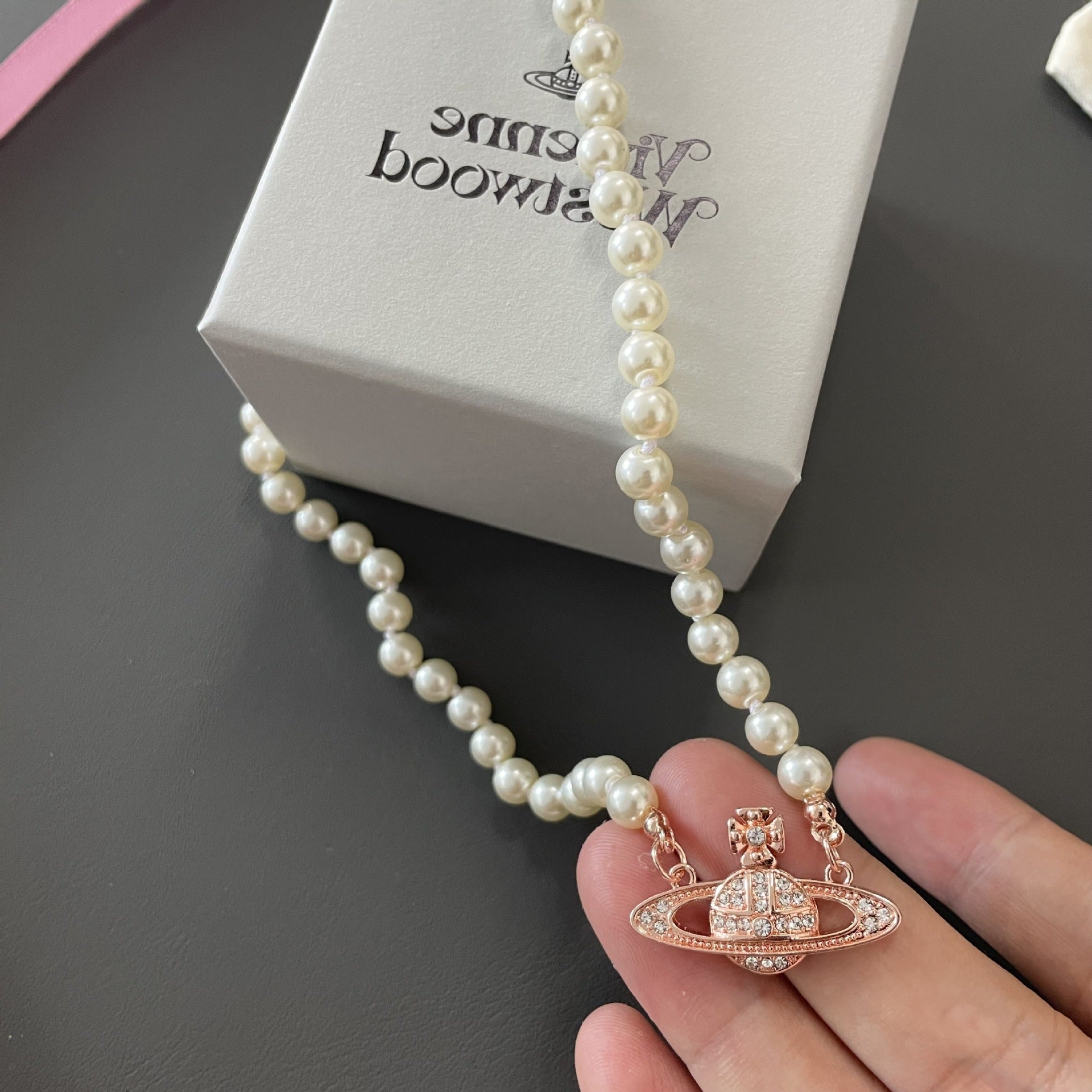 Buy replica Vivienne Westwood Saturn Pendant Pearl Necklace and replica jewelry from PICKS Jewelry