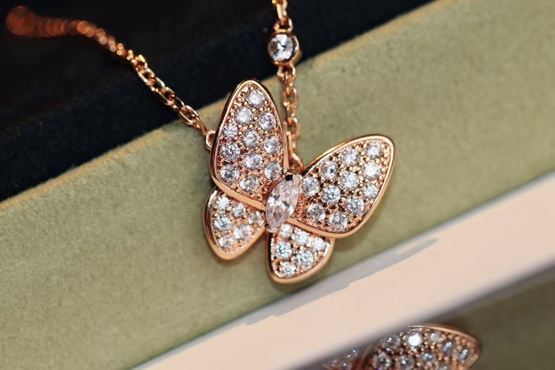 Buy replica Van Cleef & Arpels Two Butterfly Pendant Necklace and replica jewelry from PICKS Jewelry