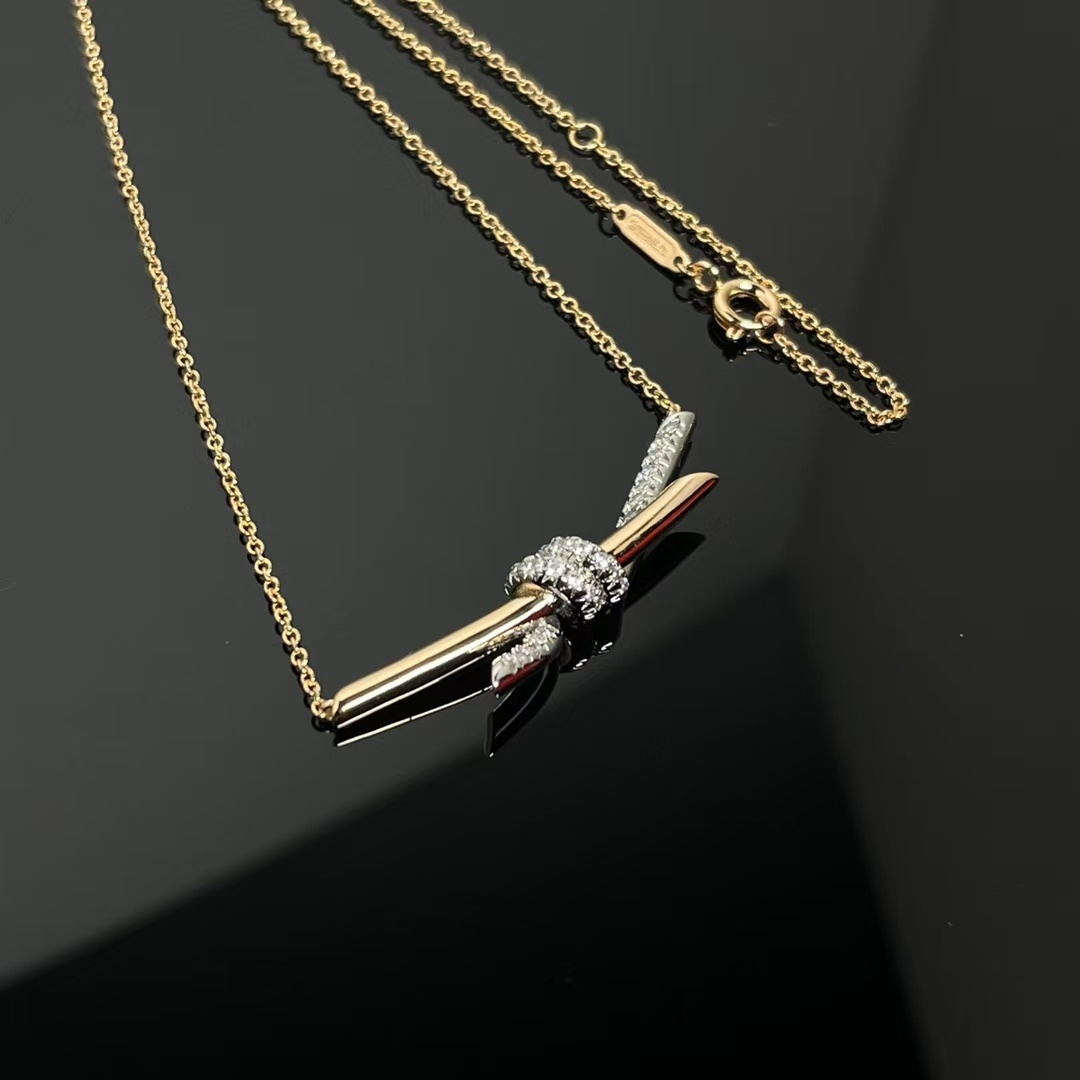 Buy replica Tiffany Knot Pendant Necklace - Mixed Metal Color and replica jewelry from PICKS Jewelry