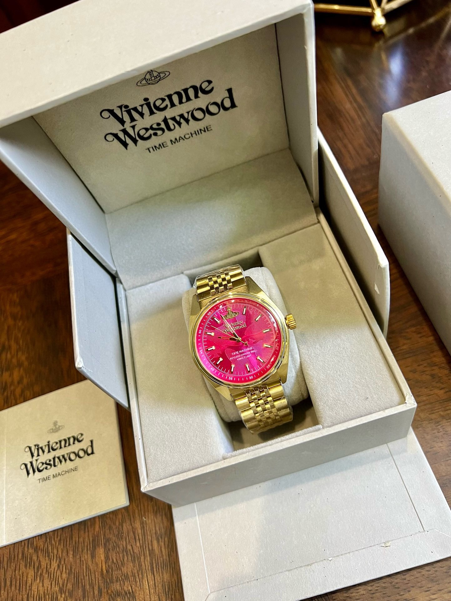 Buy replica Vivienne Westwood Rose Red Dial Gold Band Watch - 40MM and replica jewelry from PICKS Jewelry