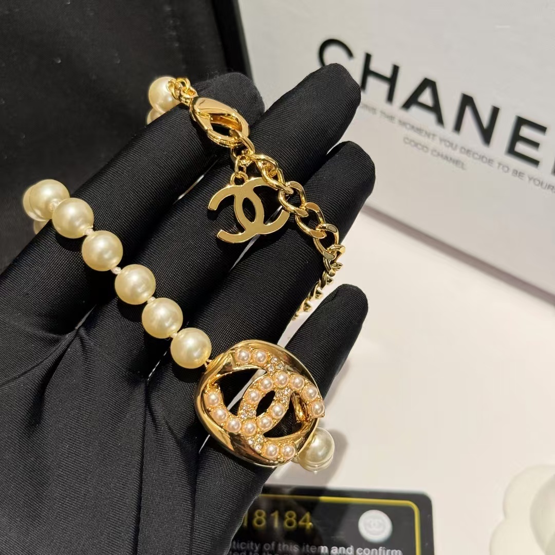 Buy replica Chanel Round Double C Pendant Pearl Choker Necklace and replica jewelry from PICKS Jewelry