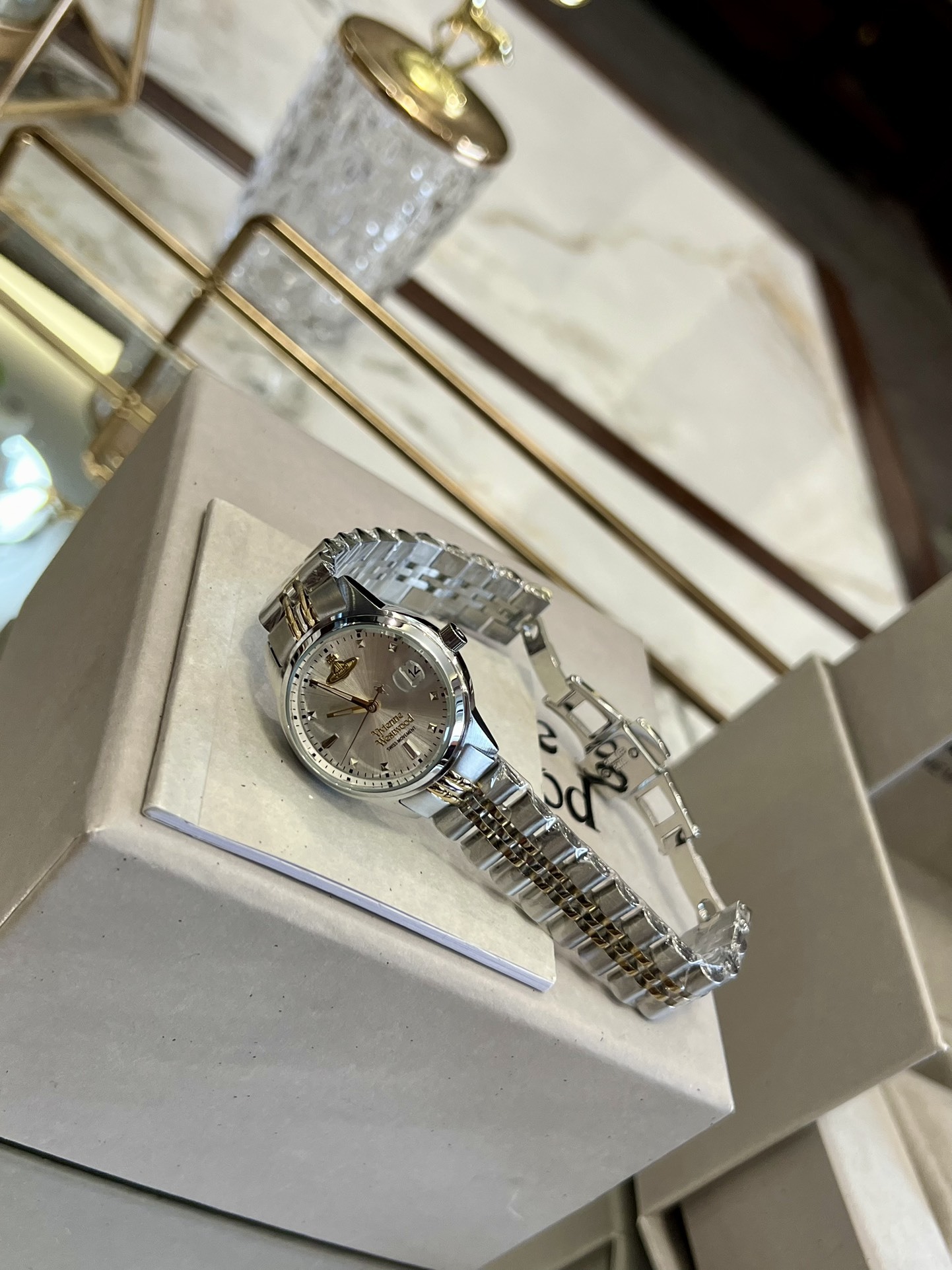 Buy replica Vivienne Westwood Silver Gold Mixed Color Band Watch - 30MM and replica jewelry from PICKS Jewelry
