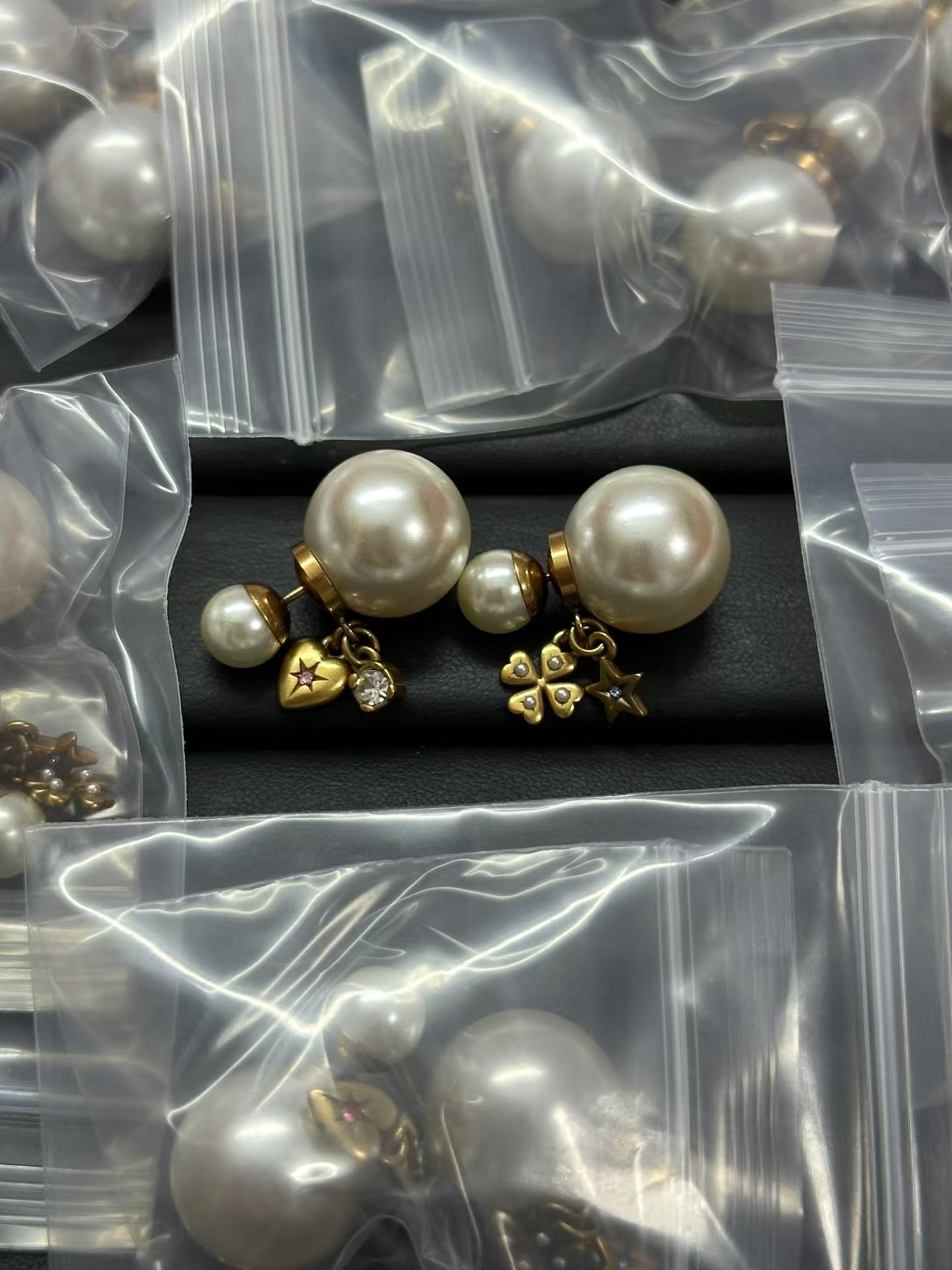 Buy replica Dior Asymmetrical Charms Pearl Earrings and replica jewelry from PICKS Jewelry