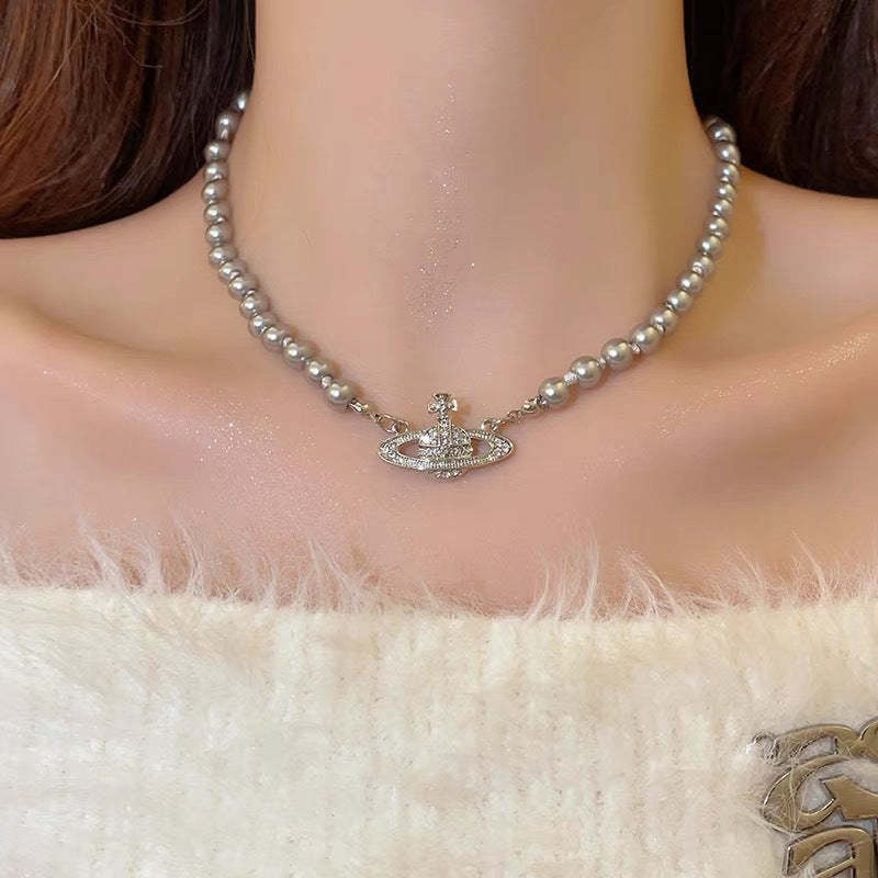 Buy replica Vivienne Westwood Saturn Pendant Grey Pearl Necklace and replica jewelry from PICKS Jewelry
