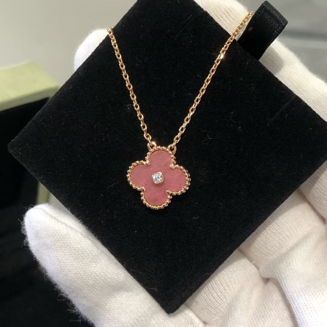 Buy replica Van Cleef & Arpels Rhodonite Vintage Alhambra Diamond 2021 Holiday Pendant Necklace and replica jewelry from PICKS Jewelry