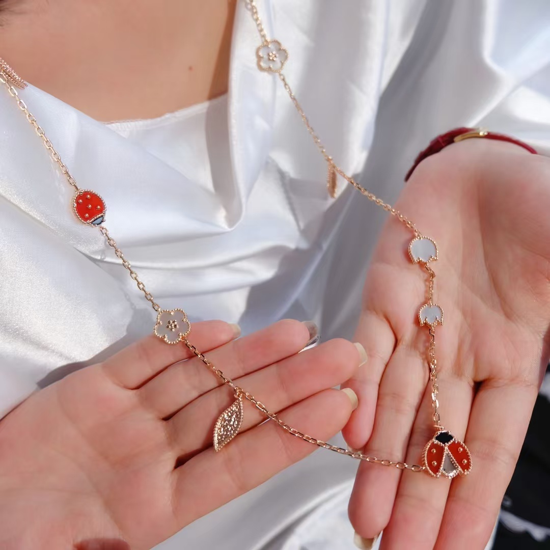 Buy replica Van Cleef & Arpels Lucky Spring Long Necklace, 15 Motifs and replica jewelry from PICKS Jewelry