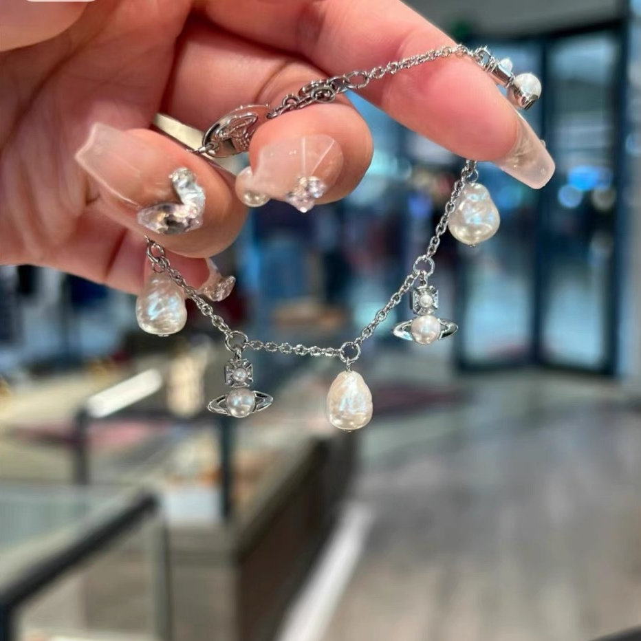 Buy replica Vivienne Westwood Baroque Pearl Saturn Charms Bracelet and replica jewelry from PICKS Jewelry