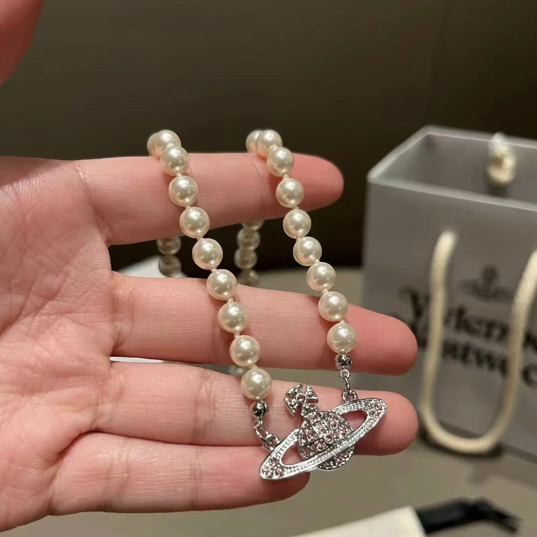 Buy replica Vivienne Westwood Pink Saturn Necklace and replica jewelry from PICKS Jewelry