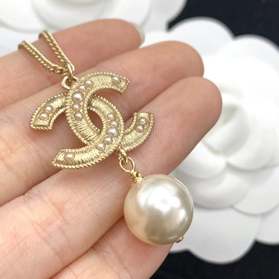 Buy replica Chanel Sweater Double C Pearl Dangle Necklace and replica jewelry from PICKS Jewelry