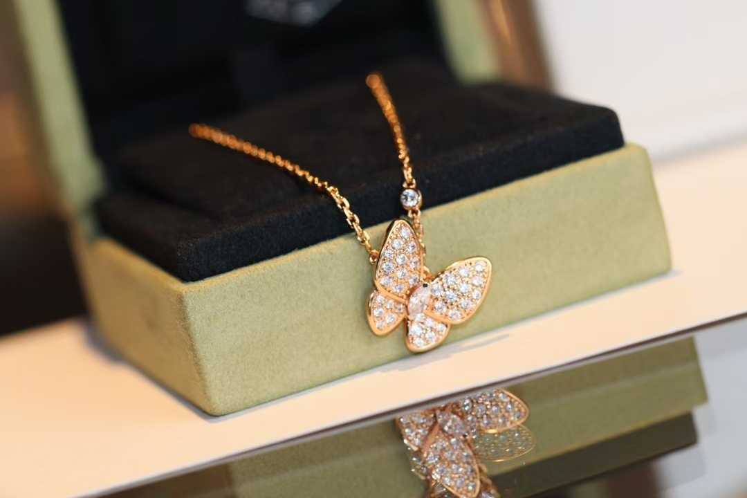 Buy replica Van Cleef & Arpels Two Butterfly Pendant Necklace and replica jewelry from PICKS Jewelry