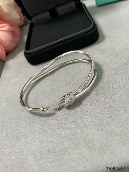 Buy replica Tiffany Knot Double Row Hinged Bangle and replica jewelry from PICKS Jewelry