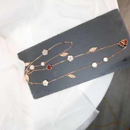 Buy replica Van Cleef & Arpels Lucky Spring Long Necklace, 15 Motifs and replica jewelry from PICKS Jewelry