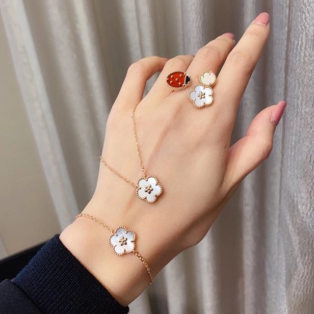 Buy replica Van Cleef & Arpels Flower and Ladybug Ring and replica jewelry from PICKS Jewelry