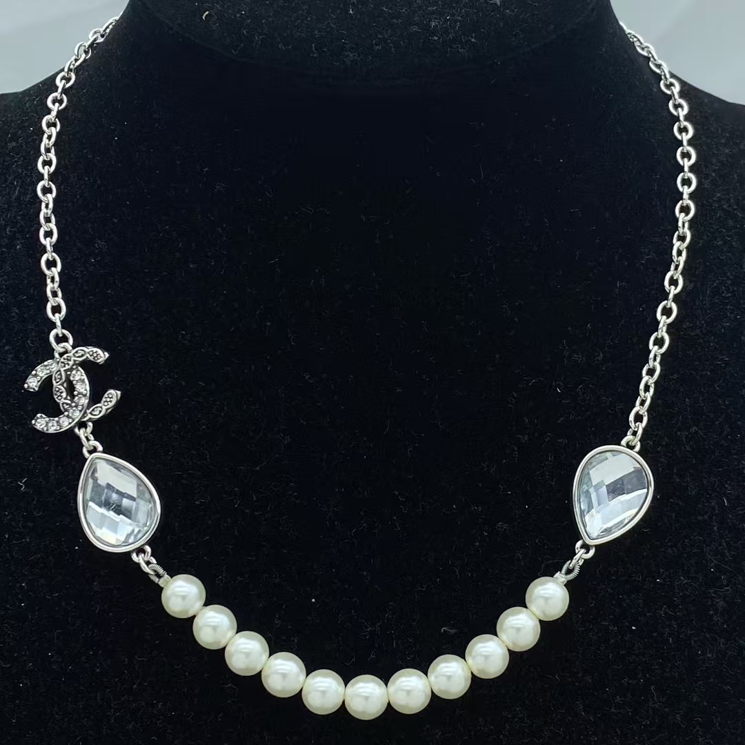 Buy replica Chanel Teardrop Rhinestone Pearl Smile Necklace and replica jewelry from PICKS Jewelry