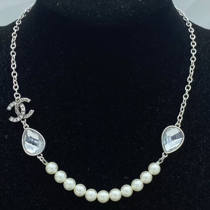 Buy replica Chanel Teardrop Rhinestone Pearl Smile Necklace and replica jewelry from PICKS Jewelry