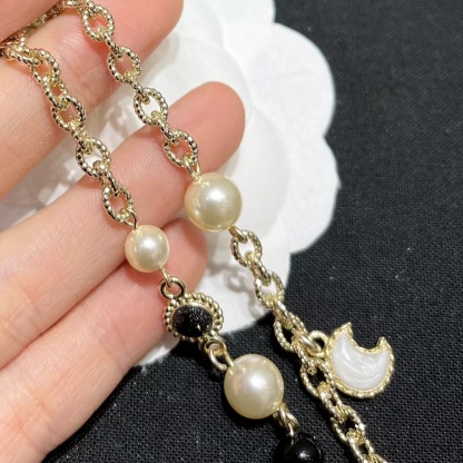 Buy replica Chanel Moon Star Pearl Charms Necklace and replica jewelry from PICKS Jewelry