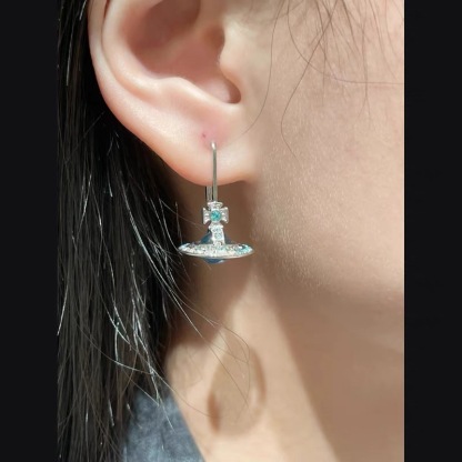 Buy replica Vivienne Westwood Gradient Color Diamond Crystal Ball Saturn Earrings and replica jewelry from PICKS Jewelry