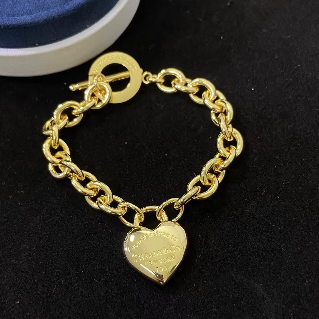 Buy replica Tiffany Heart Charm OT Clasp Bracelet and replica jewelry from PICKS Jewelry