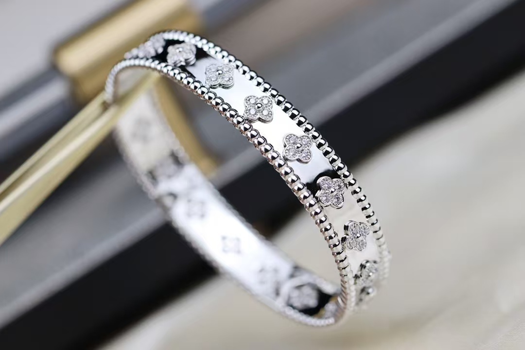 Buy replica Van Cleef & Arpels Perlée Clovers Bracelet, Medium Bangle and replica jewelry from PICKS Jewelry
